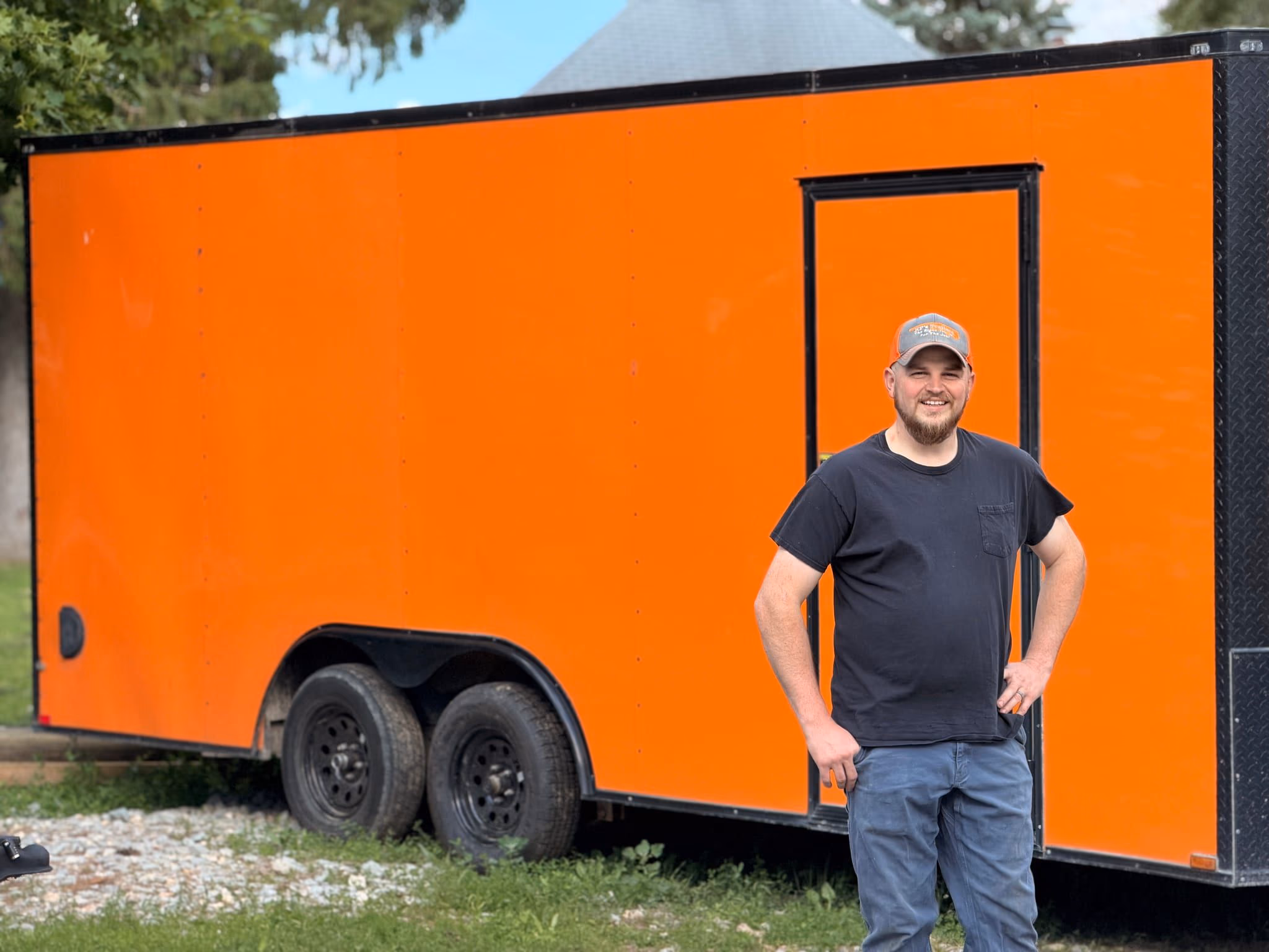 Eric Scherer from KP's Trailer and Equipment Rental with an enclosed trailer