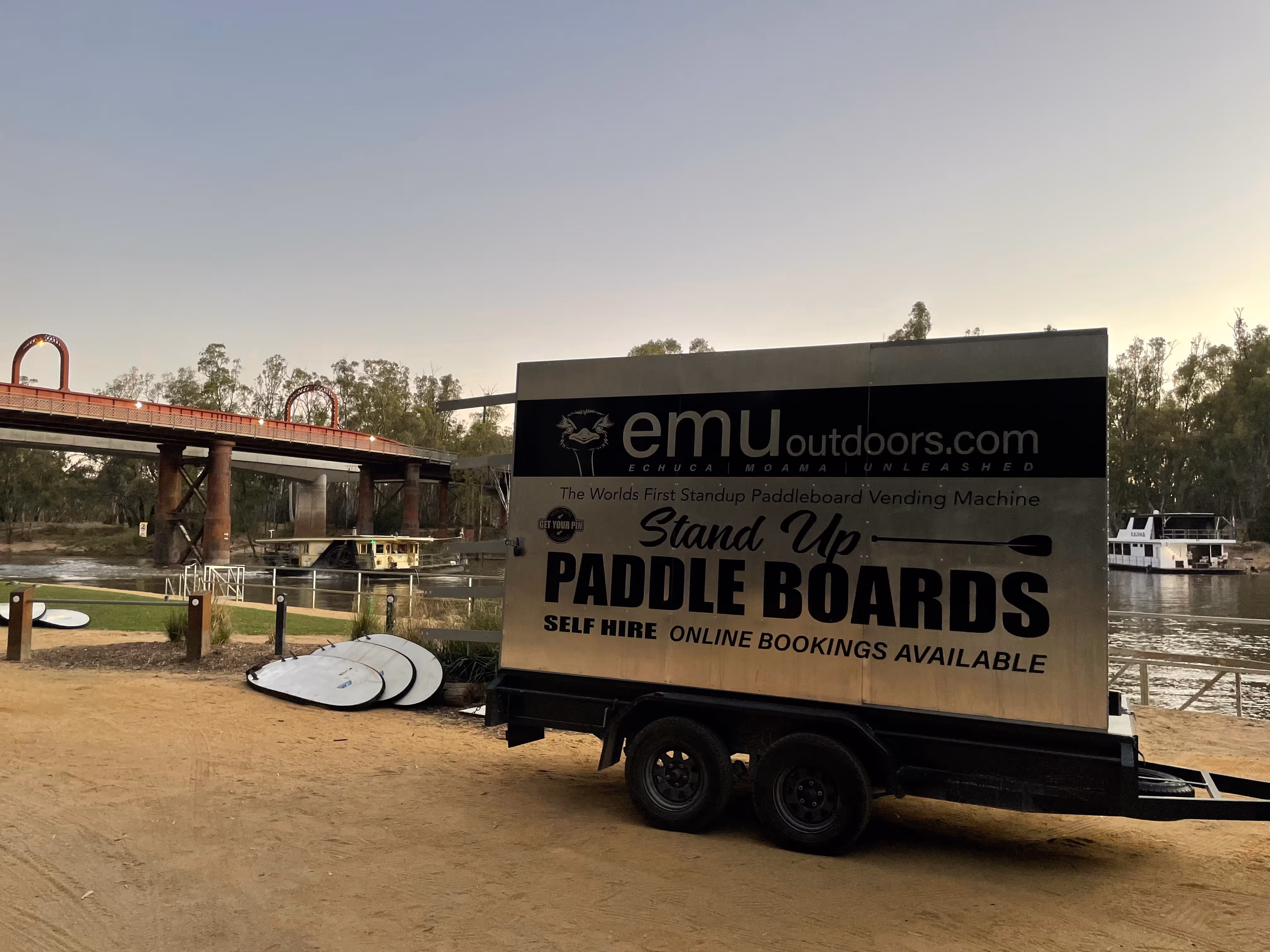 Paddle boards at a waterfront location where Lockii self-service rentals began in 2019